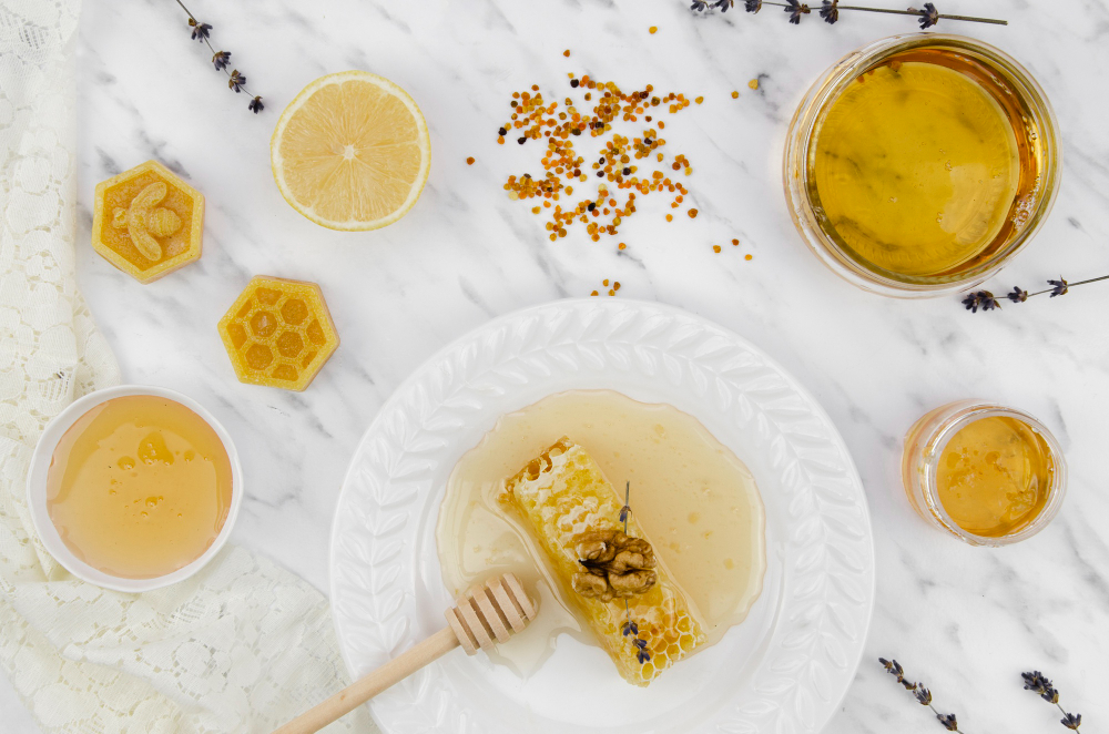 Honey and various products made with honey displayed on a table